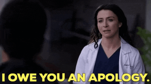 a woman in a lab coat and scrubs says i owe you an apology
