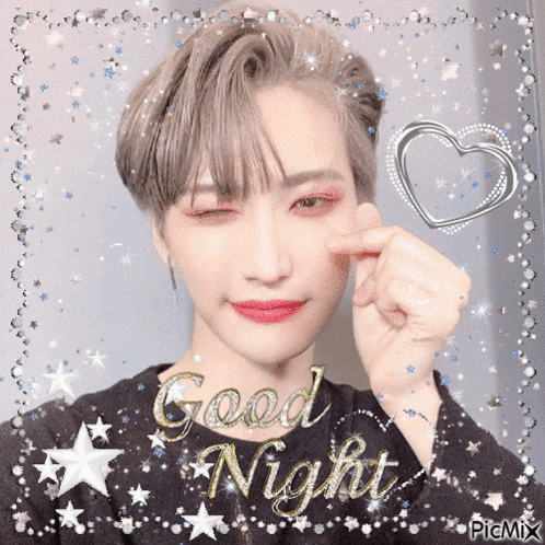 a picture of a young man with the words good night written on it
