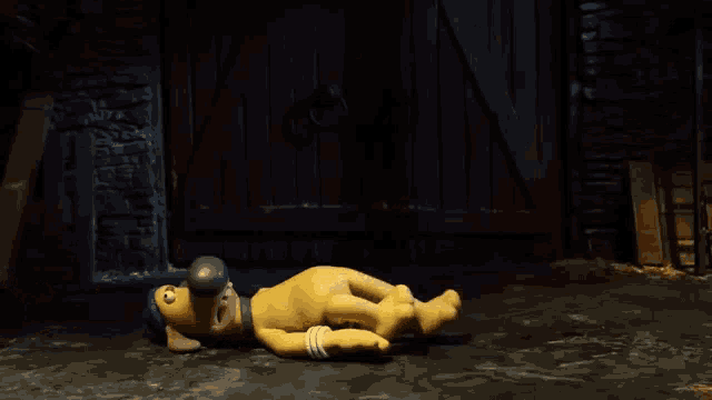 a cartoon dog is laying on its back in front of a door