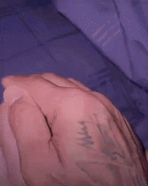 a close up of a person 's hand with a tattoo that says ' i love you '