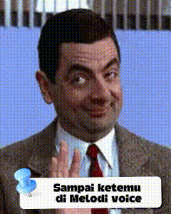 a man in a suit and tie with a pin that says " sampai ketemu di melodi voice " on it