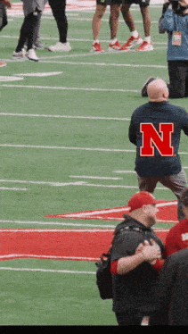 a man with the letter n on his back