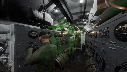 a man in a green uniform is standing in a room with a voltage meter that reads 15