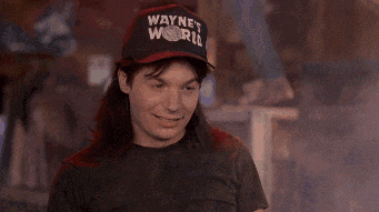 a person wearing a hat that says wayne 's world