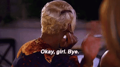 a woman with blonde hair is holding her hand to her face and says `` okay , girl . bye . ''