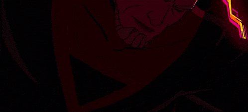 a close up of a cartoon character 's face with bright pink eyes