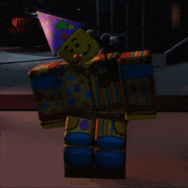 a clown with a party hat and a smiley face