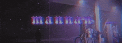 the word mannan is on a dark background