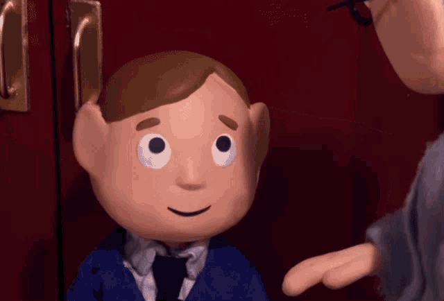 a cartoon character in a blue shirt and tie