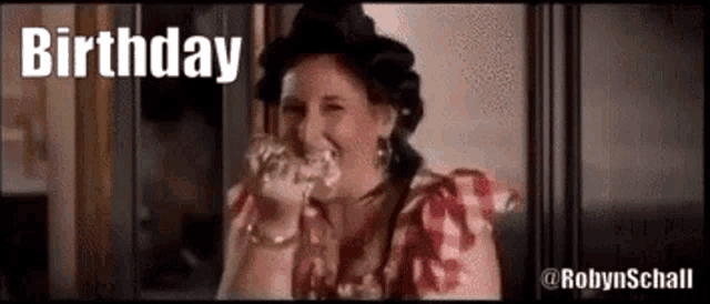 a woman in a hat is eating a piece of cake and the words `` birthday '' are written above her .