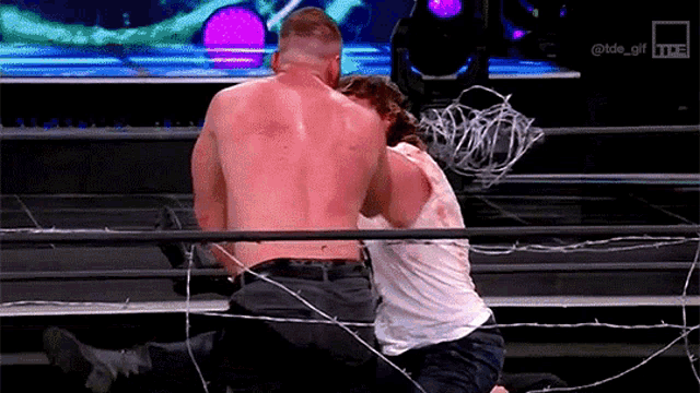 Kenny Omega Jon Moxley GIF - Kenny Omega Jon Moxley Barbed Wire GIFs