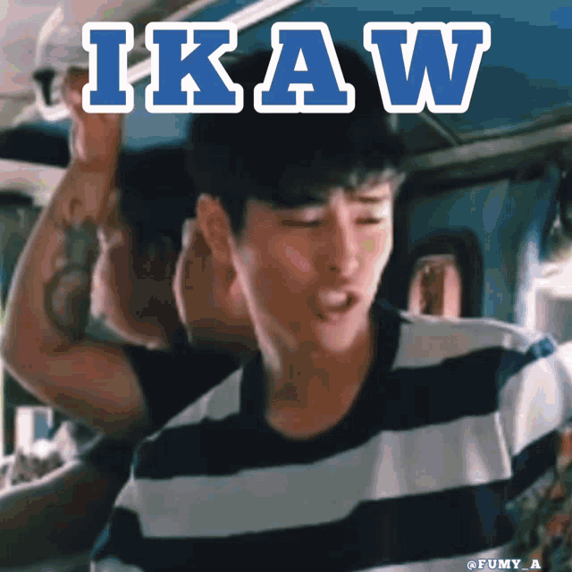 a man in a striped shirt has the word ikaw written above him