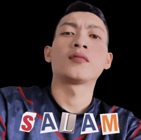 a man is wearing a shirt that says salam