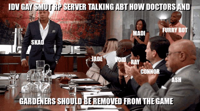 a man in a suit stands in front of a group of people with the caption idv gay smut rp server talking