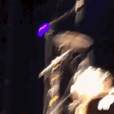 a blurry picture of a person playing a drum set