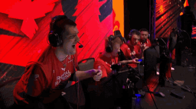 a man wearing a red shirt that says royal rumble
