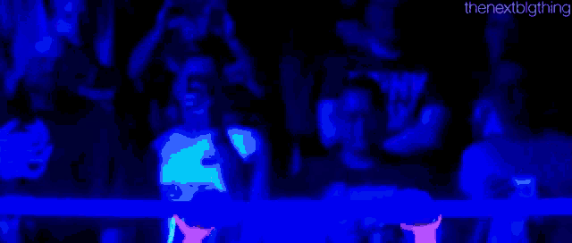 a glow in the dark image of a person with the nextbigthing written below it