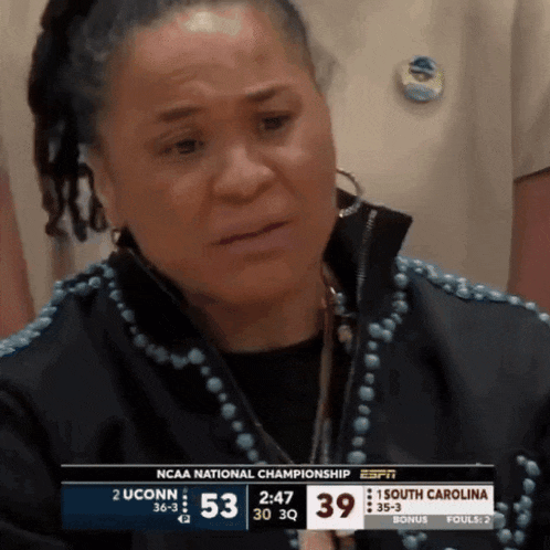 a woman is crying during the ncaa national championship