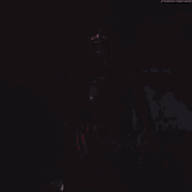 a man with dreadlocks wearing a mask and striped pants stands in the dark with the next thing written below him