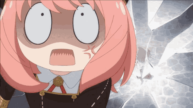 a girl with pink hair is making a funny face