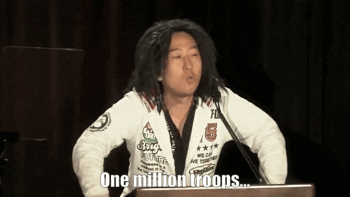 a man stands at a podium with the words one million troops written below him