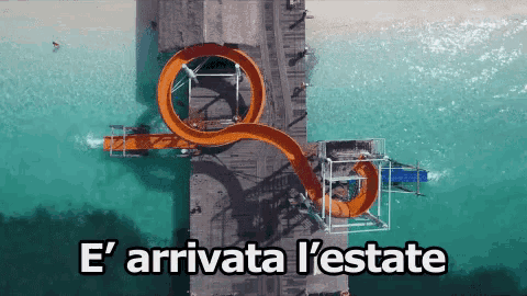 an aerial view of a water slide with the words e ' arrivata l'estate