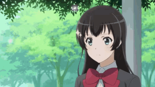 a girl with long black hair and a red bow