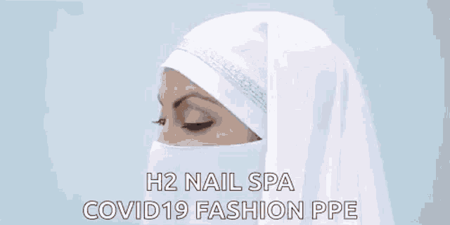 a woman wearing a white hijab and a face mask is looking at the camera .