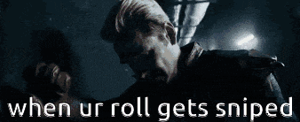 a man is walking down a dark hallway with the words `` when ur roll gets sniped '' written on the bottom .