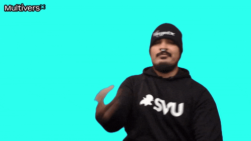 a man wearing a beanie and a sweatshirt that says " svu "