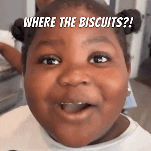 a little girl making a funny face with the words " where the biscuits " above her