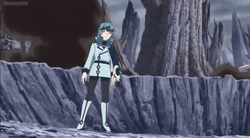 a cartoon character is standing on a rocky cliff .