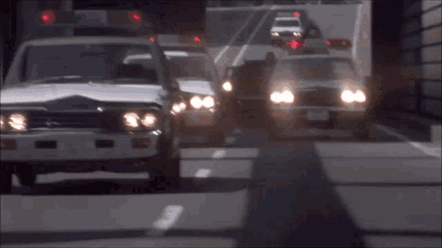a blurred image of a car with a license plate that starts with the letter t