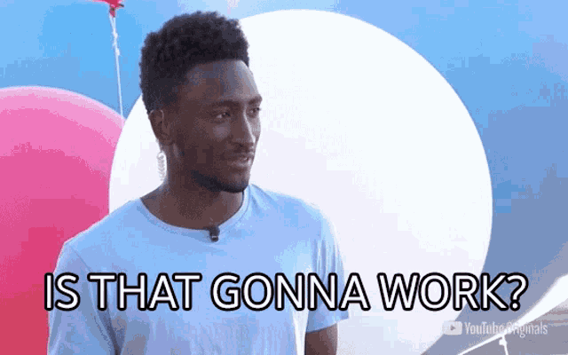 a man in a blue shirt says " is that gonna work " in front of balloons