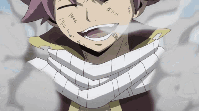 a close up of a person 's face with a scarf around his neck
