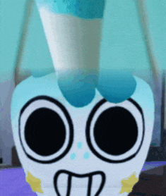 a close up of a cartoon character 's face with a tongue sticking out .