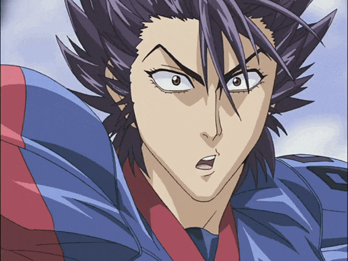 a close up of a person 's face with a surprised look on his face