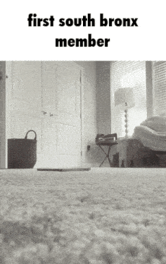 a black and white photo of a living room with the words first south bronx member above it