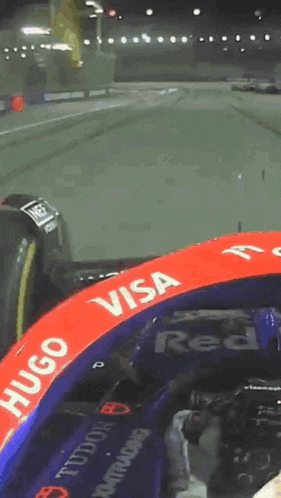 a race car with the word visa on the side of it