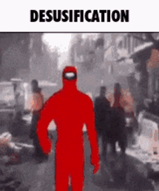 a red among us character is walking down a street in front of a group of people .