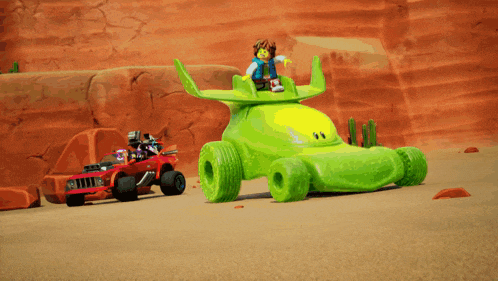 a toy story character is sitting on top of a green car