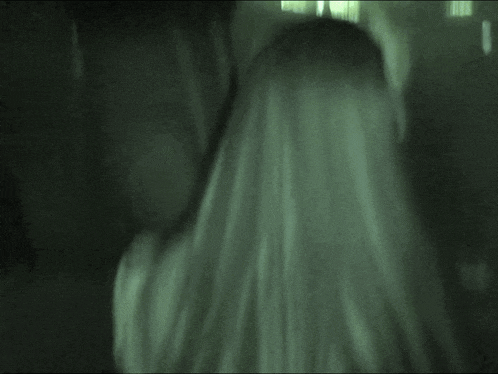 a black and white photo of a person 's face