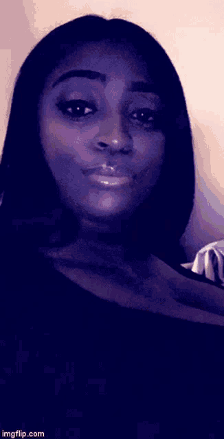 a close up of a woman 's face with the website imgflip.com visible