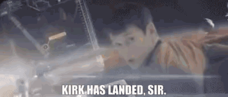 a man is flying through the air with the words `` kirk has landed , sir '' written on the screen .