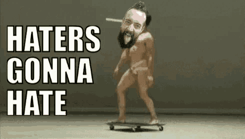 a naked man is riding a skateboard with the words `` haters gonna hate '' written on the bottom .