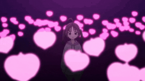 a girl is standing in front of a bunch of pink lights .