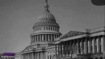 a black and white photo of the capitol building with a dome on top of it .