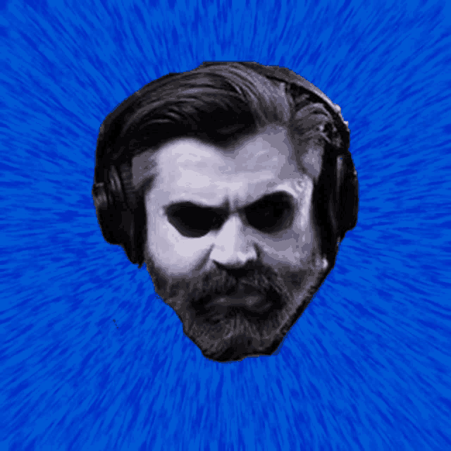 a man with a beard is wearing headphones and has a blue background