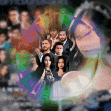a blurry picture of a woman with a crown on her head and a group of people