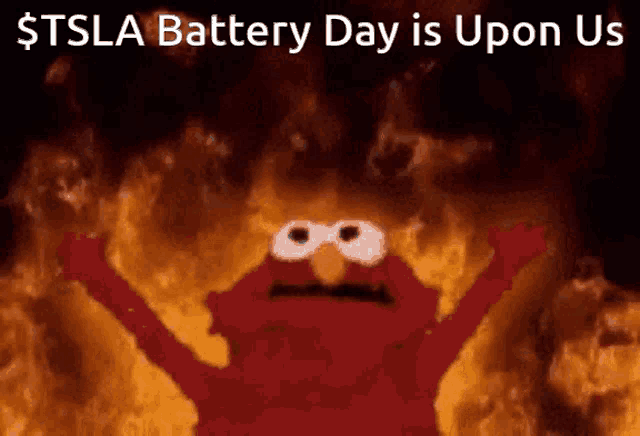 elmo is surrounded by flames with the words $ tsla battery day is upon us